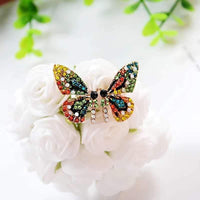 Boucles d'oreilles papillon en cristal coloré
