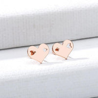 Hollow Arrow Hearts Stud Earrings
